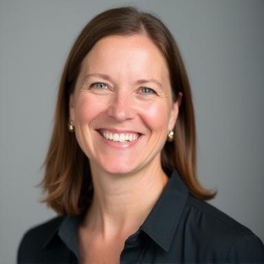 Professional headshot of Solveig Andersen, Studio Director.